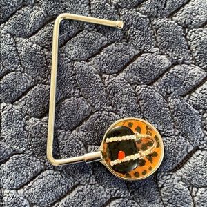 Decorative purse holder on flat surfaces